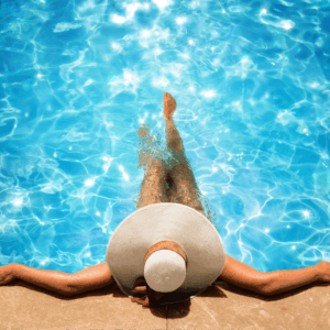 Pool Woman in Hat in Pool