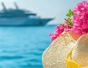 Cruise ship on the water with floral hat and sunglasses